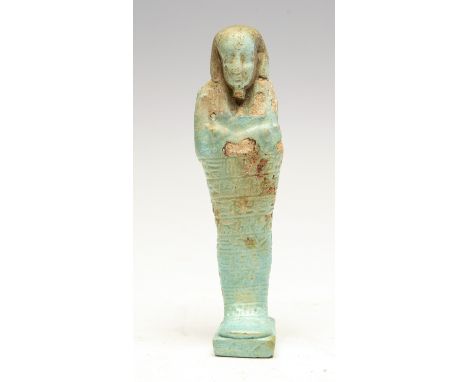Egyptian Large Faience ShabtiLate Dynastic Period, 26th Dynasty, C. 525 BC.A large faience figure in the form of a mummiform 