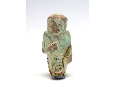 Egyptian Bright Faience Shabti,Late Period C. 664 - 332 BC.An Egyptian Late Period faience shabti figure with clear details a