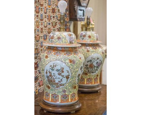 TABLE LAMPS, a pair, Chinese ceramic, of lidded ginger jar form, with Imperial yellow ground and inset white foliate panels, 
