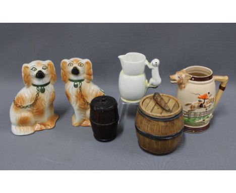 Early 20th century pottery to include a pair of chimney spaniels, hunting jug, tobacco jars, etc (6) 