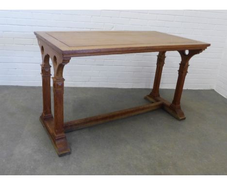 Gothic Revival light oak table by Morison &amp; Co Edinburgh, rectangular top on trestle end supports, united by a stretcher,