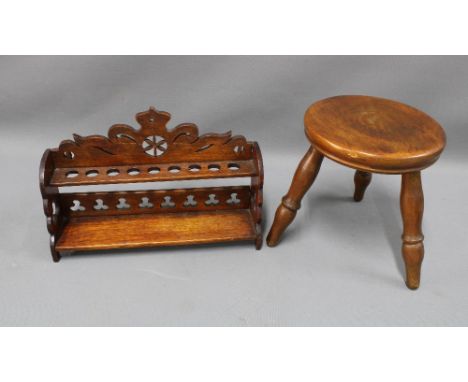 Small round mahogany three legged stool together with a mahogany shelf. 24 x 21cm. (2) 