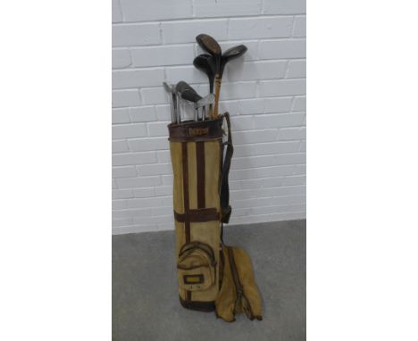 Set of vintage left handed golf clubs with canvas golf bag, (a lot) 