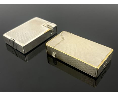 Alfred Dunhill, a Broadboy silver plated lighter, together with a Savory example, engine turned, patent numbers 440072 and 47