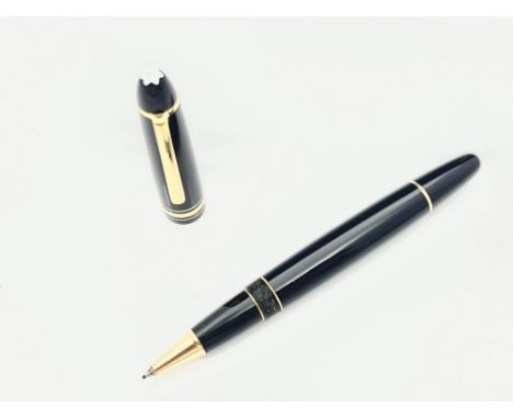 Montblanc, a Meisterstuck Le Grand 162 rollerball pen, black with gold trim, 14.5cm long