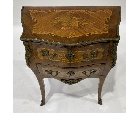A small kingwood commode of Louis XV design, serpentine bombe form, floral and scroll marquetry inlaid throughout, two short 