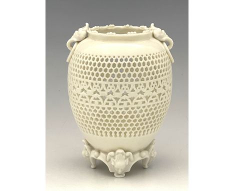 George Owen for Royal Worcester, a reticulated vase, circa 1895, ovoid shouldered form, relief moulded with ring and mask han