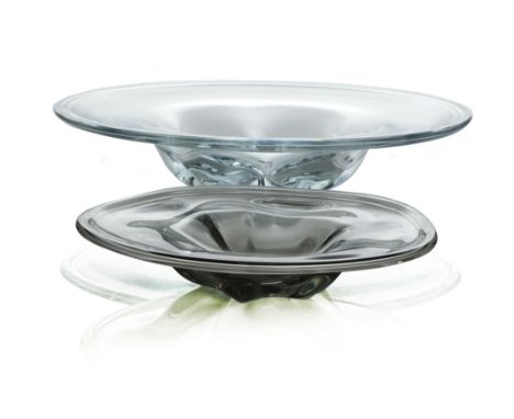 Two Modernist Orrefors glass dishes, circa 1950s, lobed bases with folded rims, incised marks, B610, 28.5cm diameter (2)