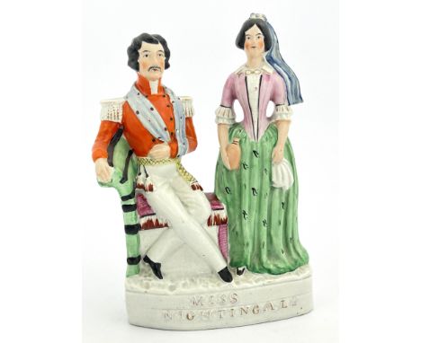 A mid 19th Century Staffordshire pottery flatback figure group, Miss Nightingale, circa 1855, modelled as Florence Nightingal