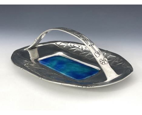 Archibald Knox for Liberty and Co., a Tudric Arts and Crafts pewter and enamelled basket, model 0357, oval form, relief mould