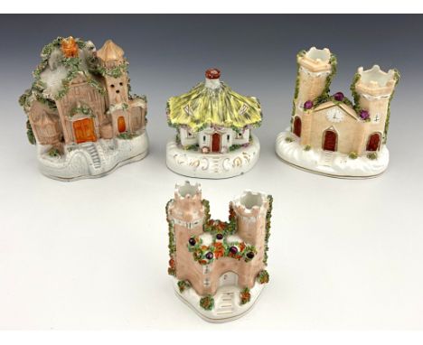 Four 19th Century pastille burners/flatback buildings, to include a flatback Gothic manor house with towes, a turreted castle