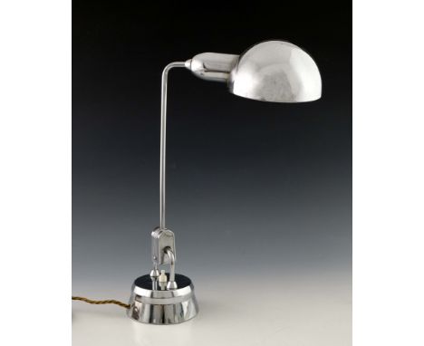  Perriand for Jumo, a chromed metal desk lamp, circa 1930, the hemispherical shade on adjustable angled arm and circular base