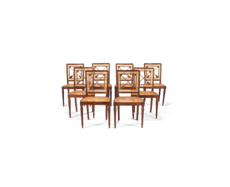 A set of eight Regency carved mahogany dining chairs attributed to Gillows, rectangular reeded backs with arrow and quiver op