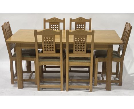 A contemporary light oak dining suite, comprising rectangular dining table and six dining chairs, chamfered block legs, the c