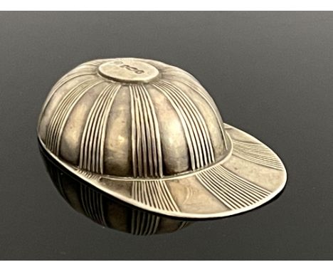 A George VI silver novelty caddy spoon, Thomas Bradbury &amp; Sons, Sheffield 1938, modelled as a jockey cap, 5.5cm diameter,