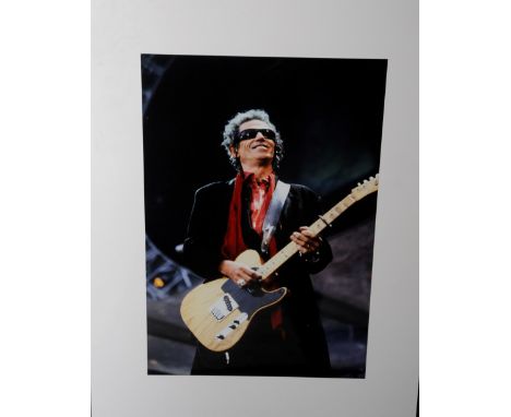 Original photograph of Keith Richards in action by photographer Mel Longhurst (Mel Longhurst was the original photographer of