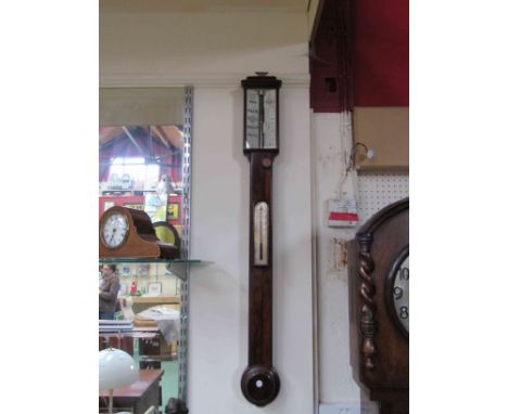 An early 19th Century rosewood marine stick barometer by West , London with black numerated and titled ivory scale plate, tur