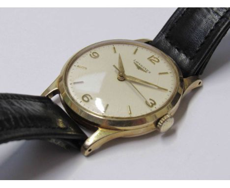 LONGINES: a 9ct gold gent's manual wind wristwatch with Arabic silvered dial, centre seconds and Longines box, case diameter 