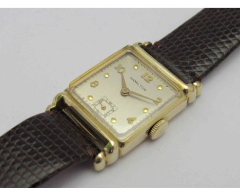HAMILTON: an Art Deco manual wind gent's gold filled wristwatch with silvered dial, Arabic and dot markers, subsidiary second