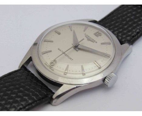 LONGINES:  a Conquest Watersport manual wind gent's steel wristwatch, silvered dial with centre seconds, circa 1958, case dia