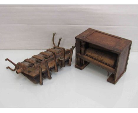 Two Black Forest musical clock wooden assemblies with bellows