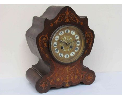 A 19th Century rosewood 8 day mantel clock with marquetry inliad foliate scrolls, Roman numerated dial with pendulum, 32cm hi