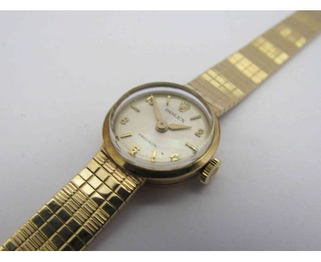 ROLEX: a Precision manual wind lady's 9ct gold bracelet watch, silvered dial, circa 1966, with 9ct gold bracelet and Rolex cl