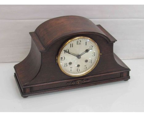 An early 20th Century oak cased mantel clock with silvered Arabic dial, three train movement, 23cm high