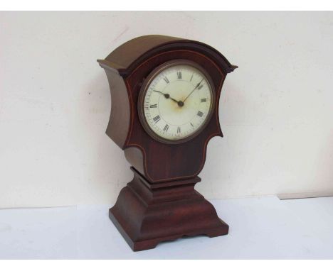 An Edwardian mahogany shaped top mantel clock with Roman enamelled dial, 24cm high