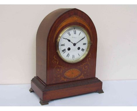 An Edwardian mahogany and inlaid lancet form mantel clock with Roman enamelled dial signed J.W. Benson, 8-day movement and ke