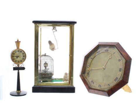 Novelty reproduction automaton bird in a cage clock, with two other birds, within a four glass case, 10.5" high; also a novel