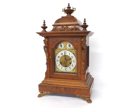 Junghans walnut three train bracket clock, the 6.25" brass arched dial with subsidiary chime/silent and slow/fast dials, the 