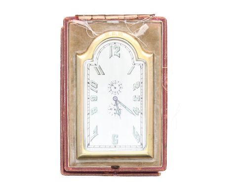 Brass travel strut alarm clock timepiece, the silvered arched dial with subsidiary alarm and seconds dials, within a brass ca