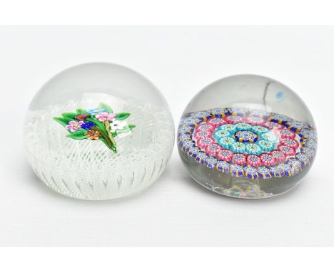 A PAUL YSART GLASS PAPERWEIGHT, with flat bouquet featuring PY cane under the weight flower surrounded by and above a band of
