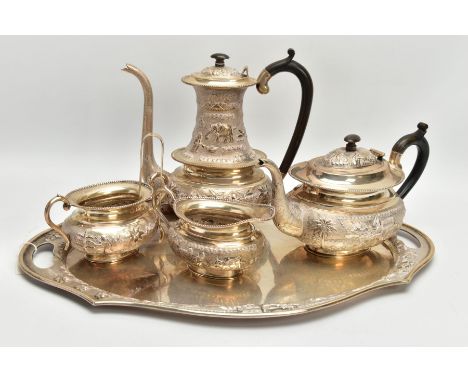 A MID 20TH CENTURY INDIAN SILVER FIVE PIECE TEA AND COFFEE SET ON A TWIN HANDLED OVAL TRAY, comprising coffee pot, tea pot, m