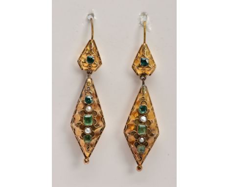 A PAIR OF LATE VICTORIAN GOLD GEM DROP EARRINGS, each of an elongated diamond shape outline, set with a central vertical line