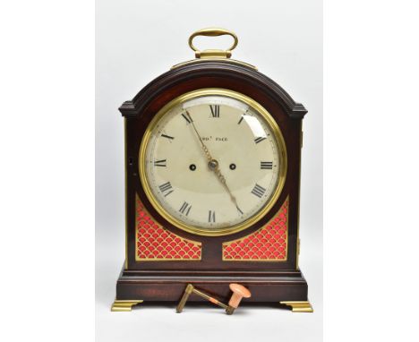 A GEORGE III MAHOGANY AND BRASS CASED TWIN FUSEE EIGHT DAY BRACKET CLOCK, the arched top with hinged carrying handle, the hin