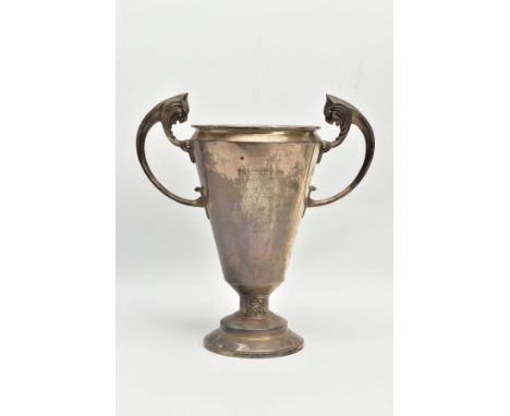 A GEORGE V SILVER TWIN HANDLED TROPHY CUP OF CONICAL FORM, the handles cast with lion mask topped 'C' scrolls, the cup engrav