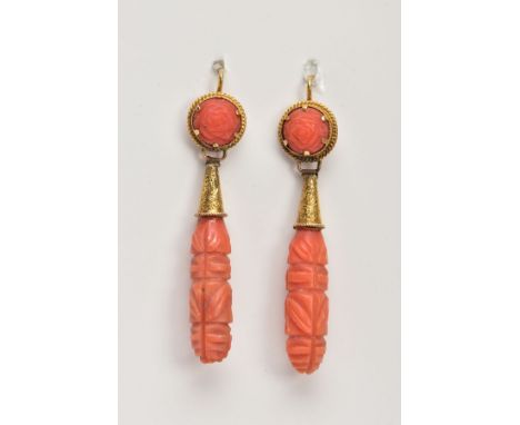 A PAIR OF LATE VICTORIAN CARVED CORAL DROP EARRINGS, each designed as an elongated drop carved with horizontal and diagonal l