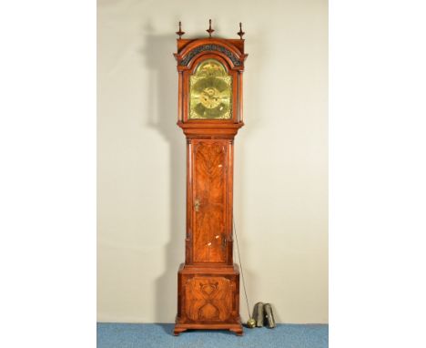 A GEORGE II WALNUT EIGHT DAY LONGCASE CLOCK,  the hood with stained glass arched panel above cylindrical pillars surrounding 