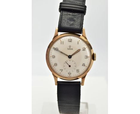 A 9CT GOLD HAND WOUND ROLEX TUDOR WRISTWATCH, light cream dial with Arabic numerals, subsidiary dial to six o'clock, case wid