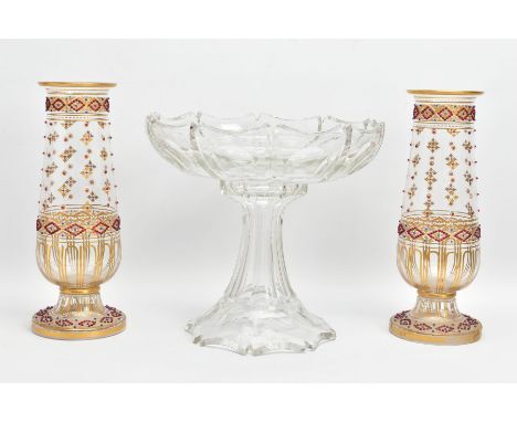 A PAIR OF LATE 19TH CENTURY CLEAR GLASS CONICAL VASES, the gilt geometric designs with red and blue glass bead jewelled decor