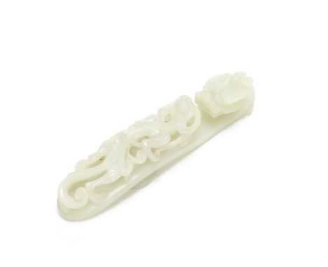 A WHITE JADE 'DRAGON' BELT HOOK19th centuryWith dragon head hook and high relief decoration of a sinuous confronting chilong 