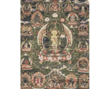 A THANGKA OF MANJUSHRITibet, Gelug, 18th/19th centuryDistemper on cloth, the central figure seated on a lotus throne, holding