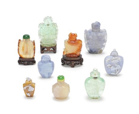 TWO GREEN FLUORITE SNUFF BOTTLES AND SEVEN AGATE BOTTLES19th centuryComprising: a large green fluorite bottle relief carved w