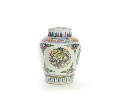 A WUCAI 'DRAGON AND PHOENIX' JARShunzhi/KangxiThe oviform jar with tapering neck and enamelled with alternating roundels of d