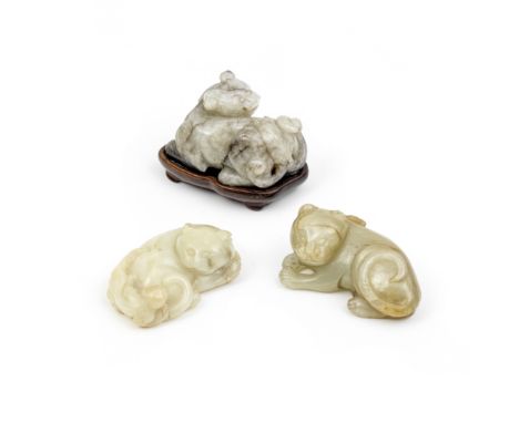 A GROUP OF TWO JADE CATS AND A BIXIELate Qing DynastyComprising: a white jade pendant with cat and cub; a yellow jade recumbe