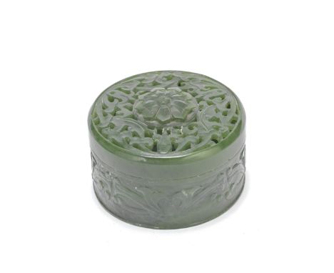 A SPINACH GREEN JADE CIRCULAR BOX AND COVER19th centuryThe box with four large lotus blooms to the exterior, the cover with a