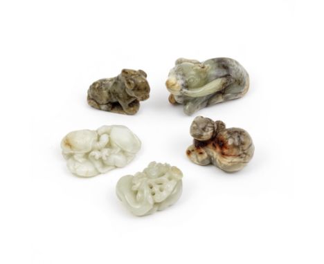 A GROUP OF FIVE JADE ANIMALSQing Dynasty and laterComprising: a grey and russet jade figure of seated qilin; a pale green jad