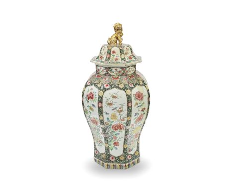 A VERY LARGE FAMILLE ROSE JAR AND COVERYongzhengOf octagonal section, the domed cover with a gilt Buddhist lion finial, both 